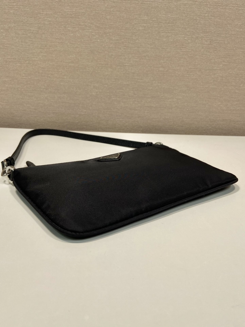 Pra*a clutch bags